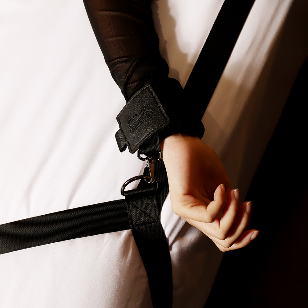 Luxury Multi Tie Points Bed Restraints Kit with black nylon straps and golden hardware, designed for versatile restraint play on any bed.