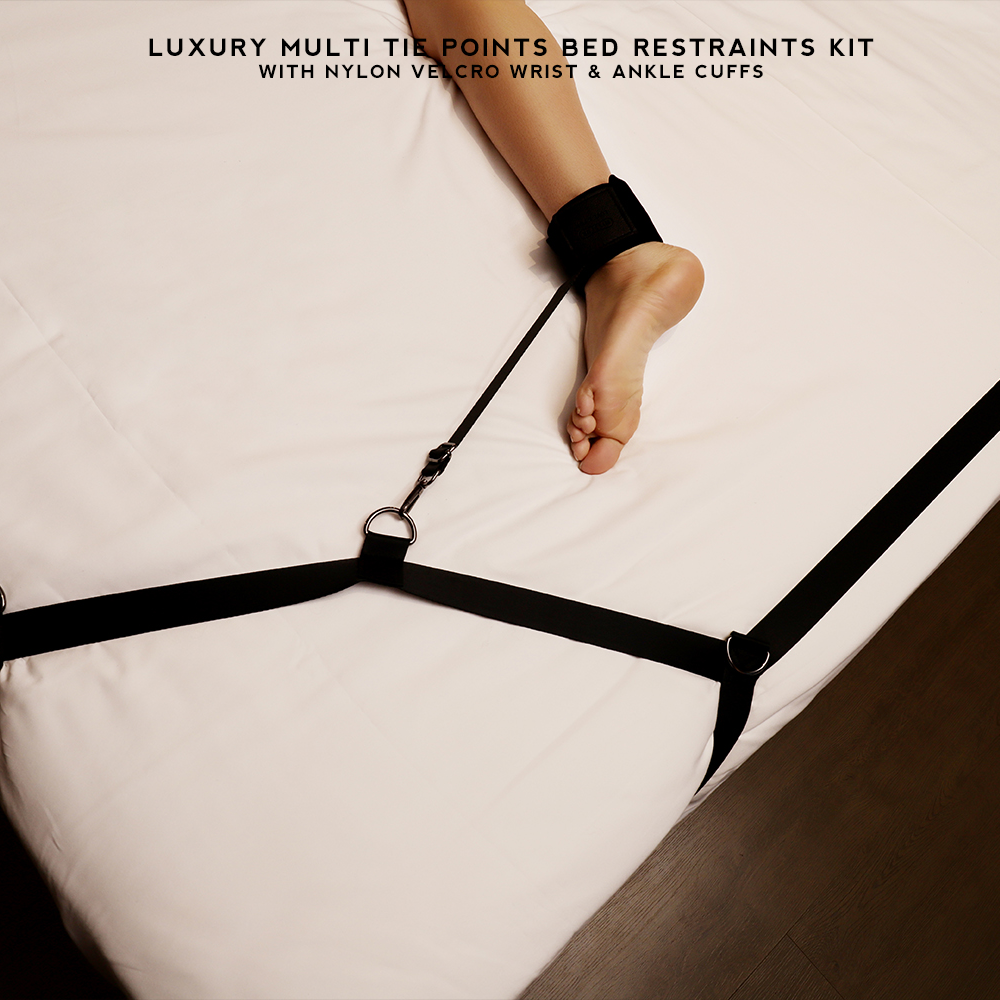 Luxury Multi Tie Points Bed Restraints Kit with black nylon straps and golden hardware, designed for versatile restraint play on any bed.