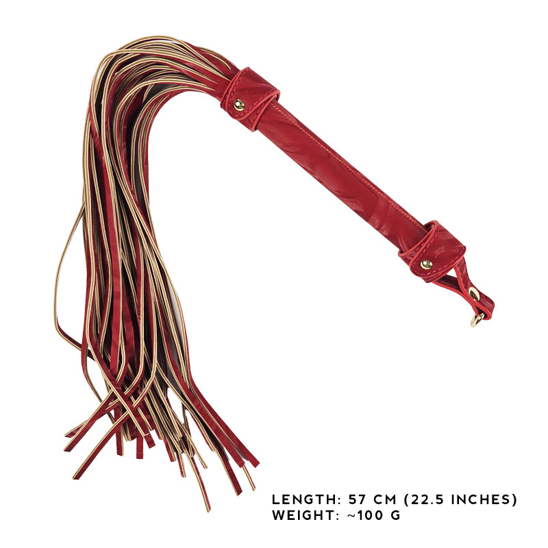 Red leather flogger with gold accents on a white background. OZGAGA Deluxe Red Passion Velvet Bondage Restraint Spanking Kit (15pc)