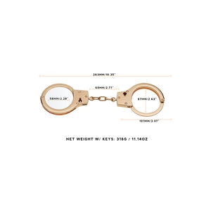 Gold stainless steel handcuffs with safety release and keys, designed for BDSM play, featuring a sleek and durable design.