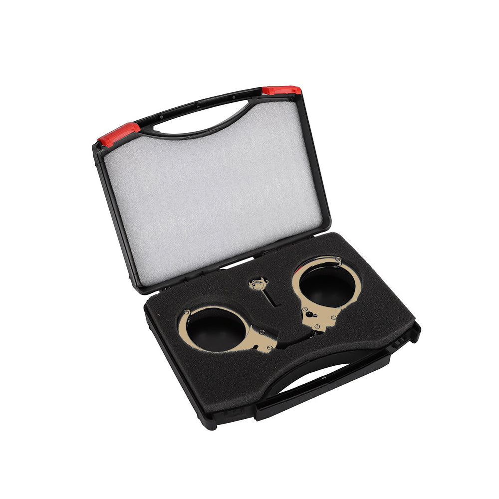 Gold stainless steel handcuffs with safety release and keys, designed for BDSM play, featuring a sleek and durable design.