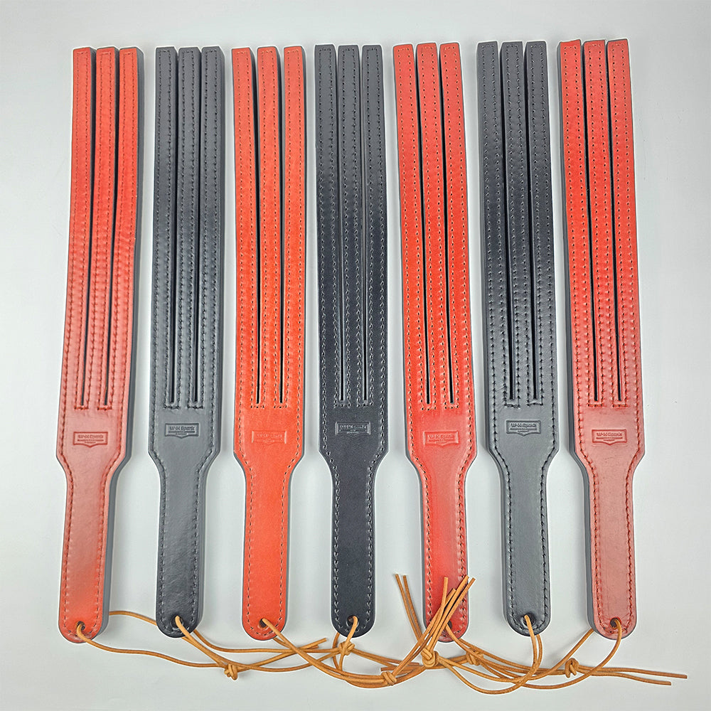 Six leather 3 Tailed Tawse arranged in two vertical rows on a light gray background. 3 Tailed Tawse