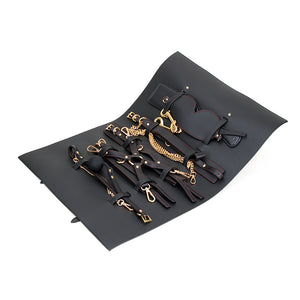 The Roll Up BDSM Tool Bag Set, 12-Piece Collection with Collar, Cuffs, Leash, Ball Gag, Blindfold, and Spanking Paddle.