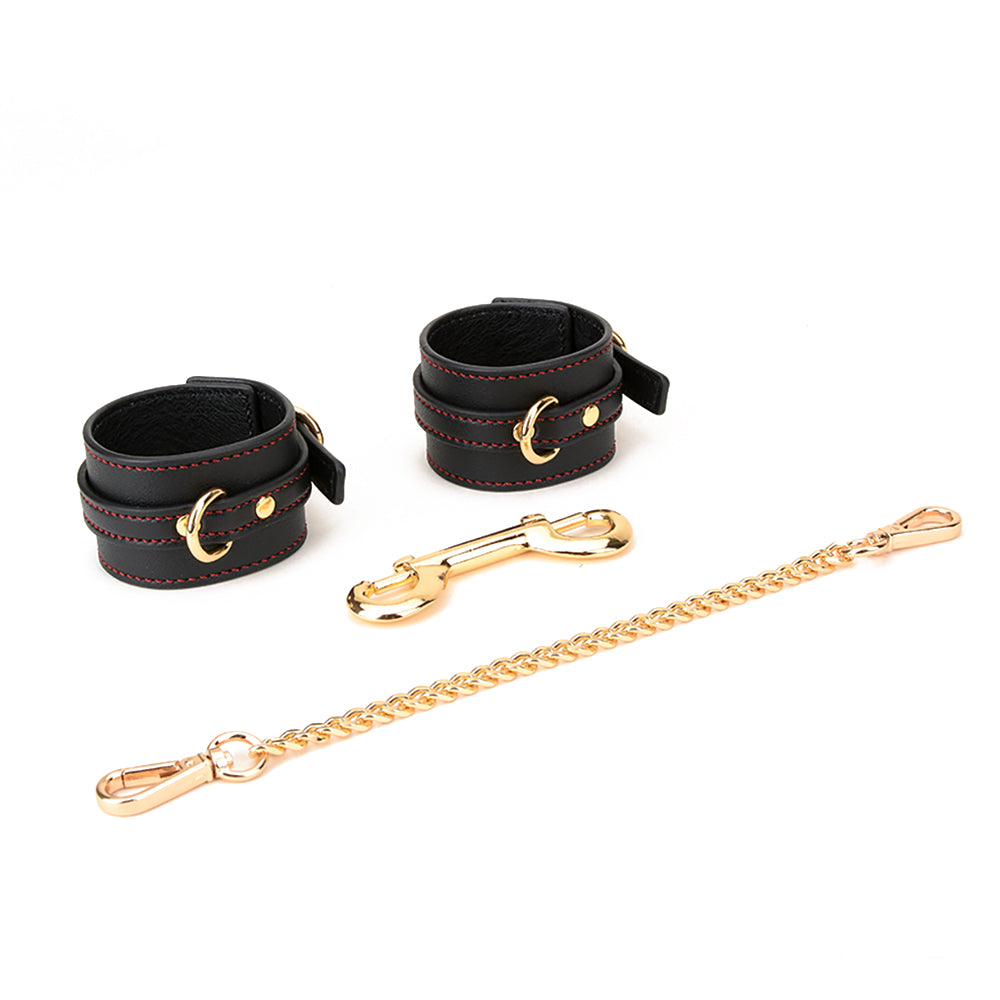 The Roll Up BDSM Tool Bag Set, 12-Piece Collection with Collar, Cuffs, Leash, Ball Gag, Blindfold, and Spanking Paddle.